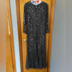 Gorgeous sparkly grey dress with beautiful beading and mesh at the bottom.